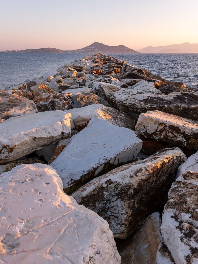 Paros — Breakwater of Palatia with Paros Island in the background, Chora, Naxos, Greece julesvernex2
